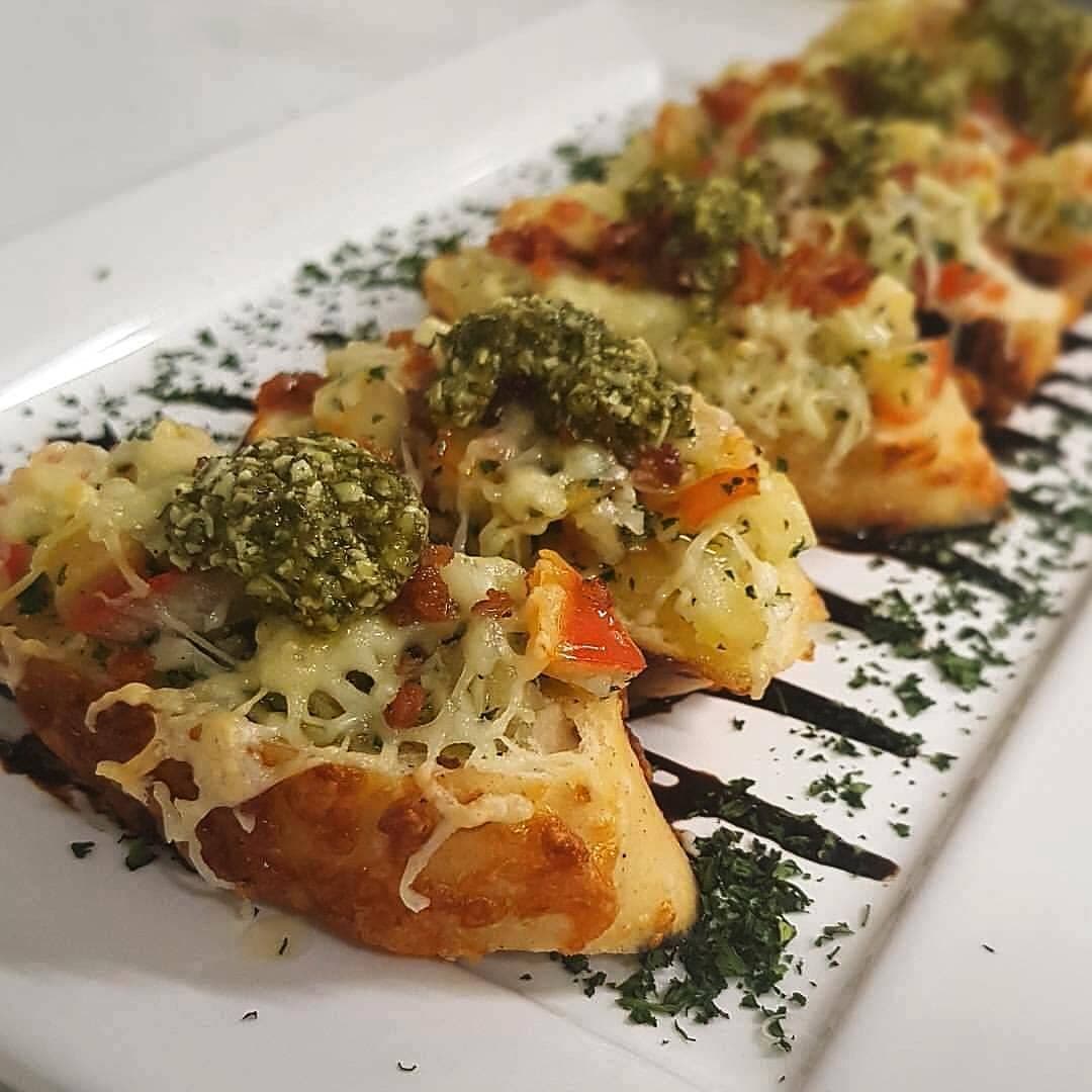 Comida tarde da noite · Mesas externas · Casual
