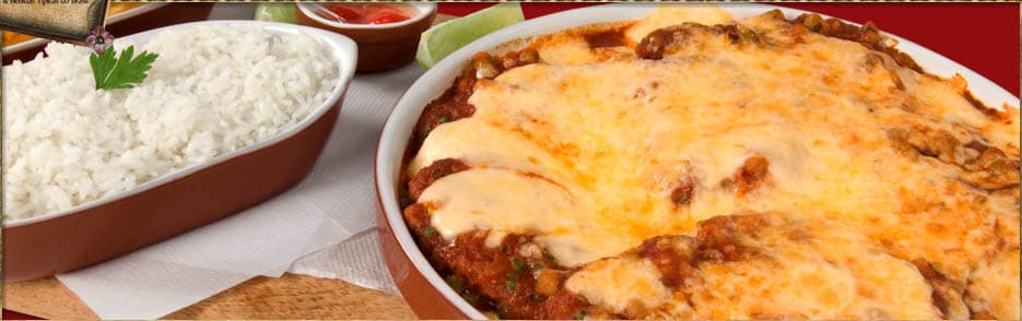 Cadeia de bares acolhedores tem cachaças seletas, pratos da cozinha brasileira e a descontração de confraria.