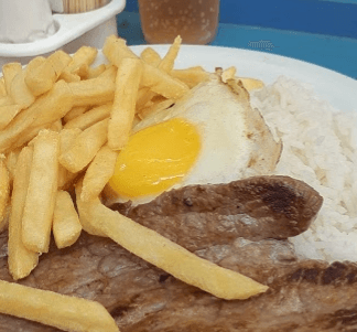 Restobar despojado, intimista e descontraído, que serve carnes seletas na grelha com acompanhamentos e opções.