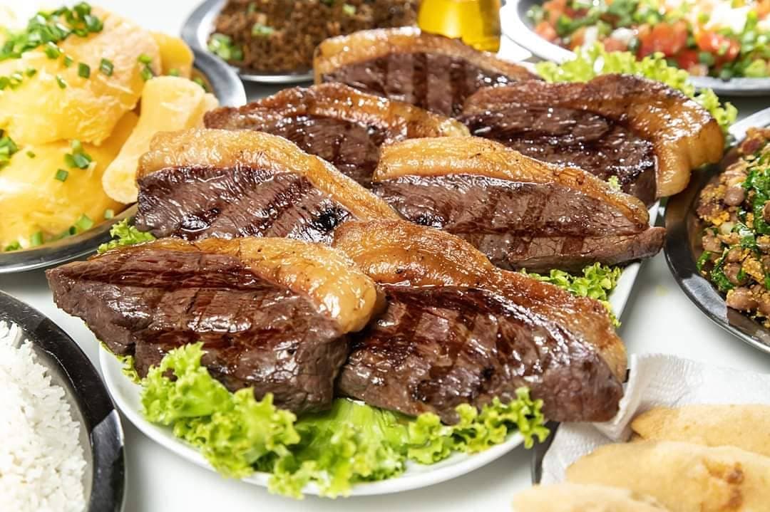 Petiscos e refeições, além de cervejas, em restaurante descontraído com tevês, varanda e espaço infantil.